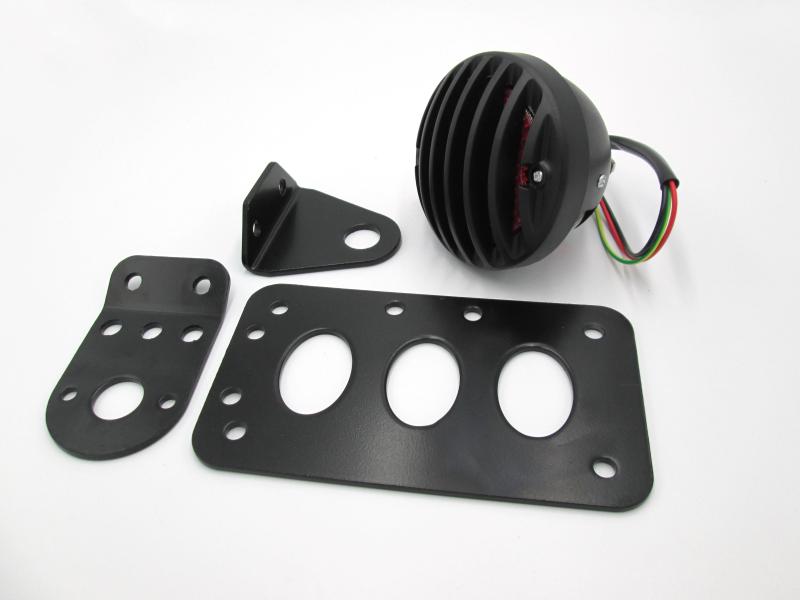STOP TRASERO CON PARRILLA PORTAPLACA LATERAL HORIZONTAL